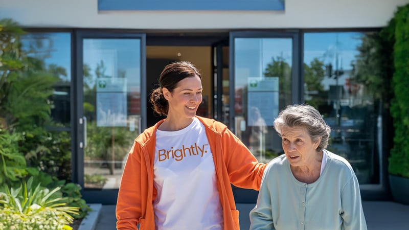 brightly-health-coaching-coach-with-member-outside-clinic