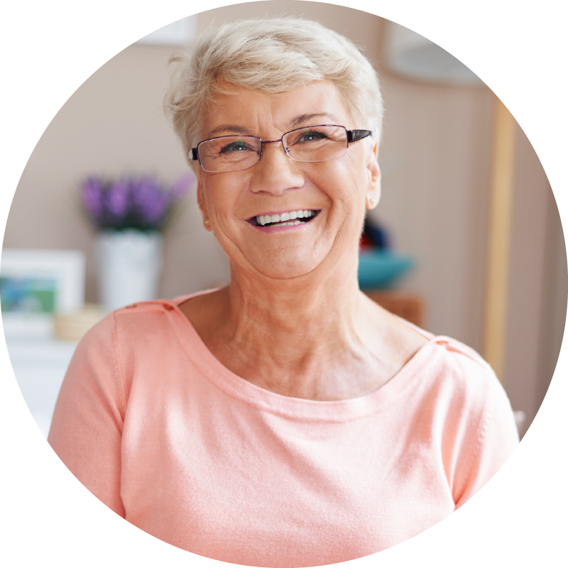 Age-Brightly-MindThrive-programme-circles-happy-older-lady-in-peach-mobile