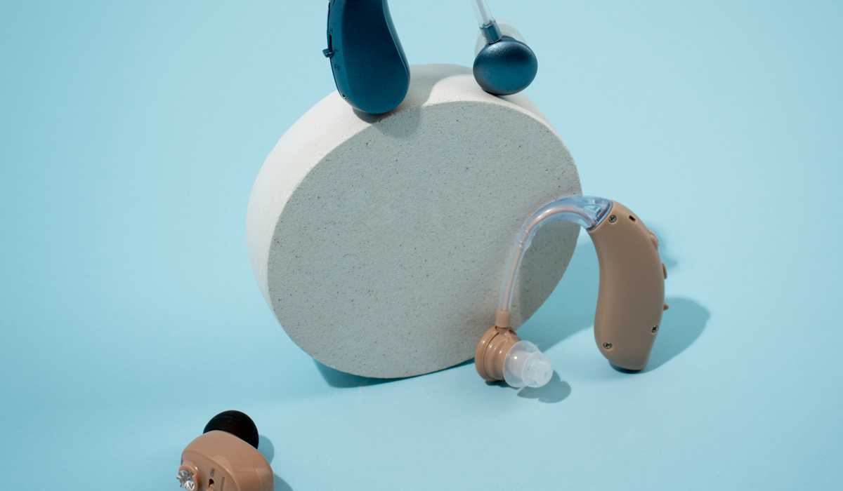 Brightly-Biomarkers-hearing-aids-with-blue-background