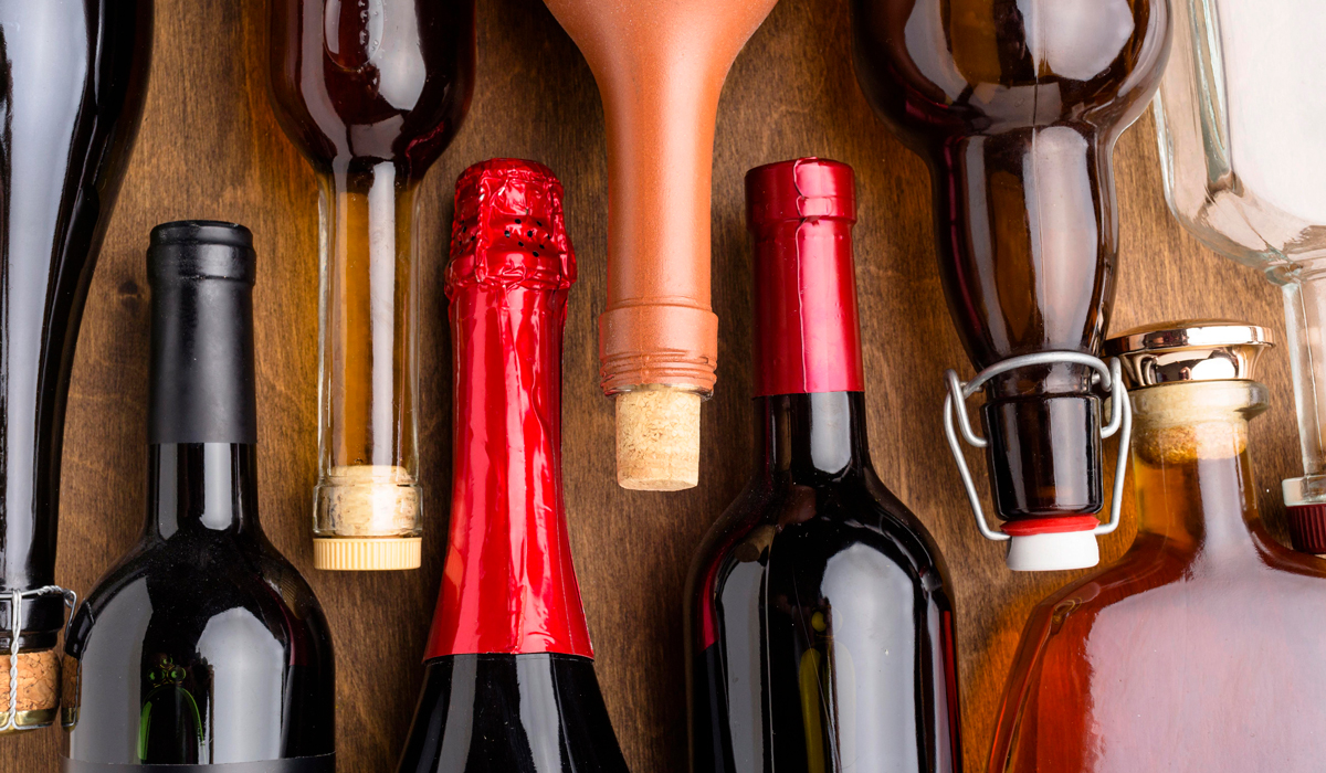 Brightly-Biomarkers-top-view-bottles-alcohol-assortment